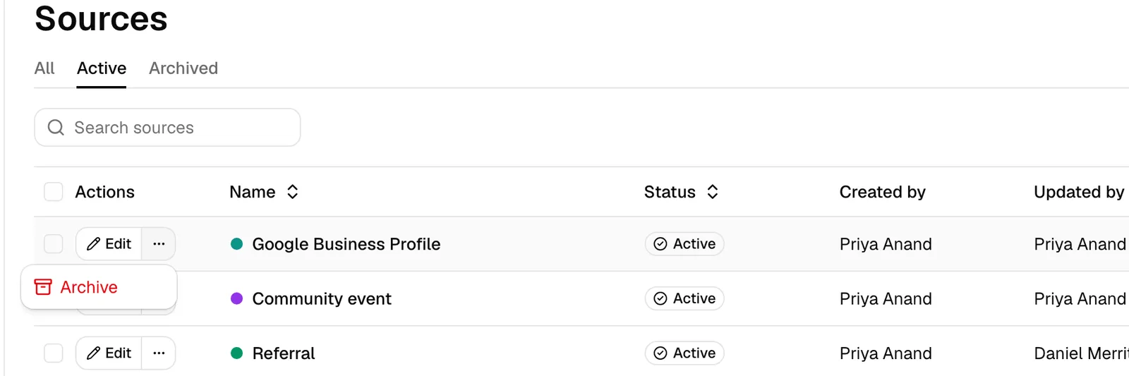 A source row's "..." menu open, showing the Archive option, with the Active / Archived tabs visible above the table.