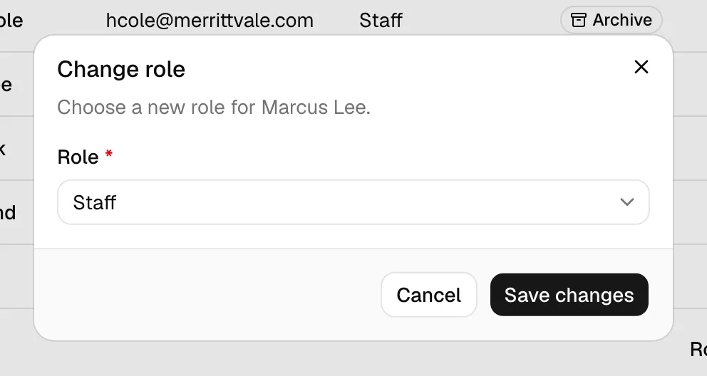 The Change role dialog with the member's name in the description, the Role dropdown, and the Save changes button.
