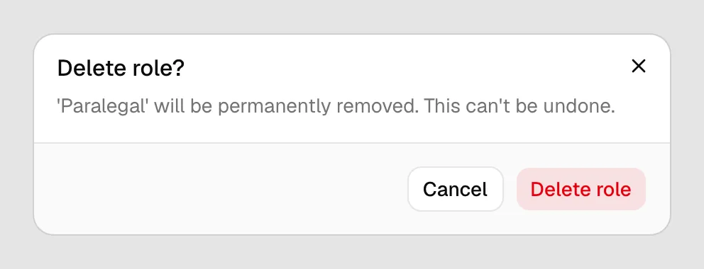 The Delete role? confirmation dialog showing the warning text and the Delete role button.