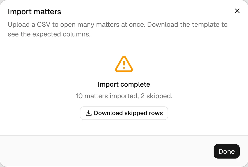 The completion summary showing the amber warning, "N matters imported, M skipped", and the Download skipped rows button, alongside the downloaded report open