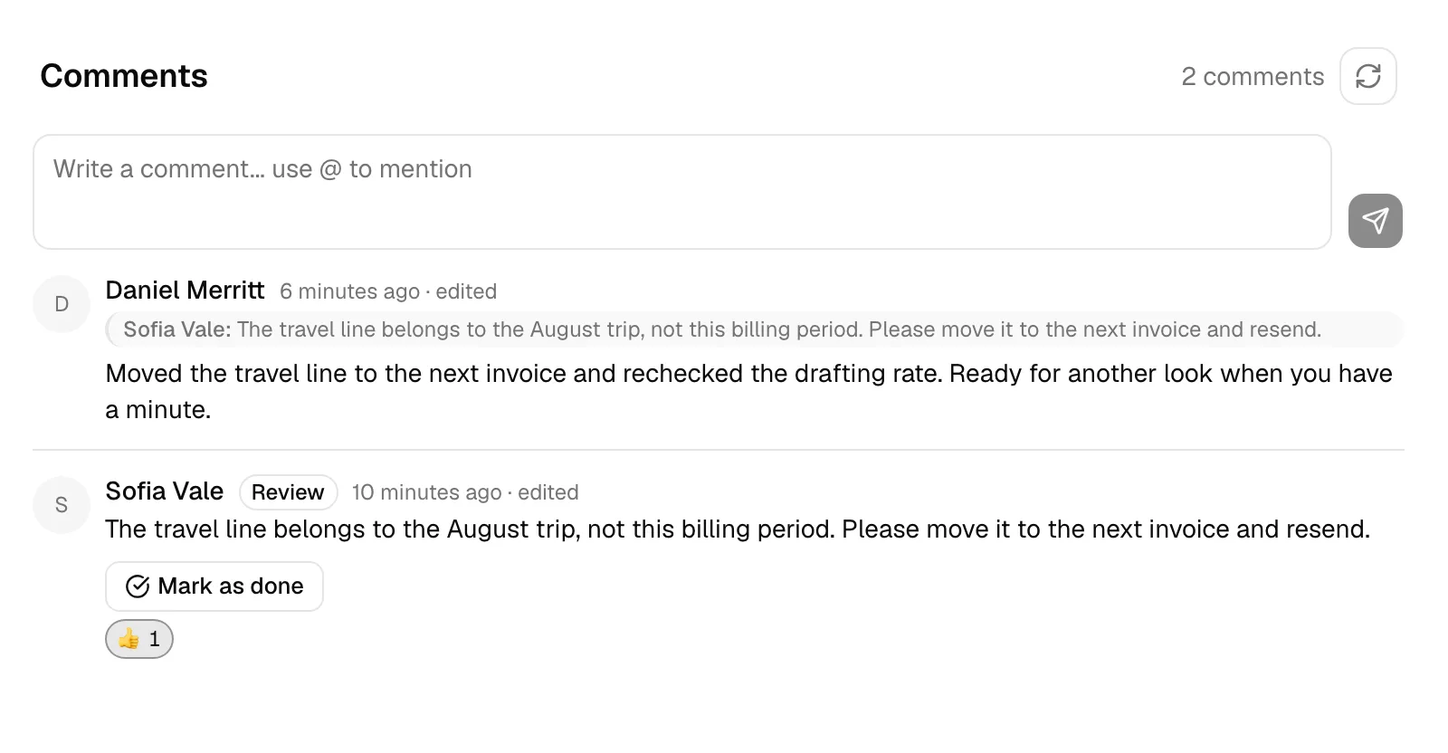 The Comments section on an invoice page, showing the comment box with the @-mention hint, a short thread with a reaction counter, and one comment carrying the