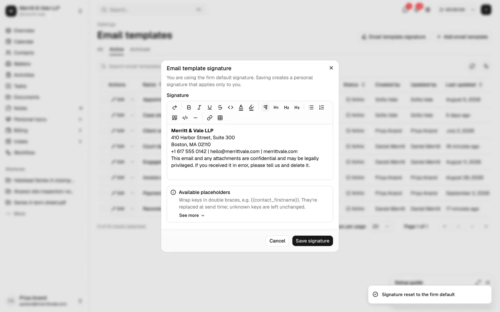 The Email template signature dialog mid-reset, with the Reset to firm default button highlighted and a confirmation toast reading "Signature reset to the firm
