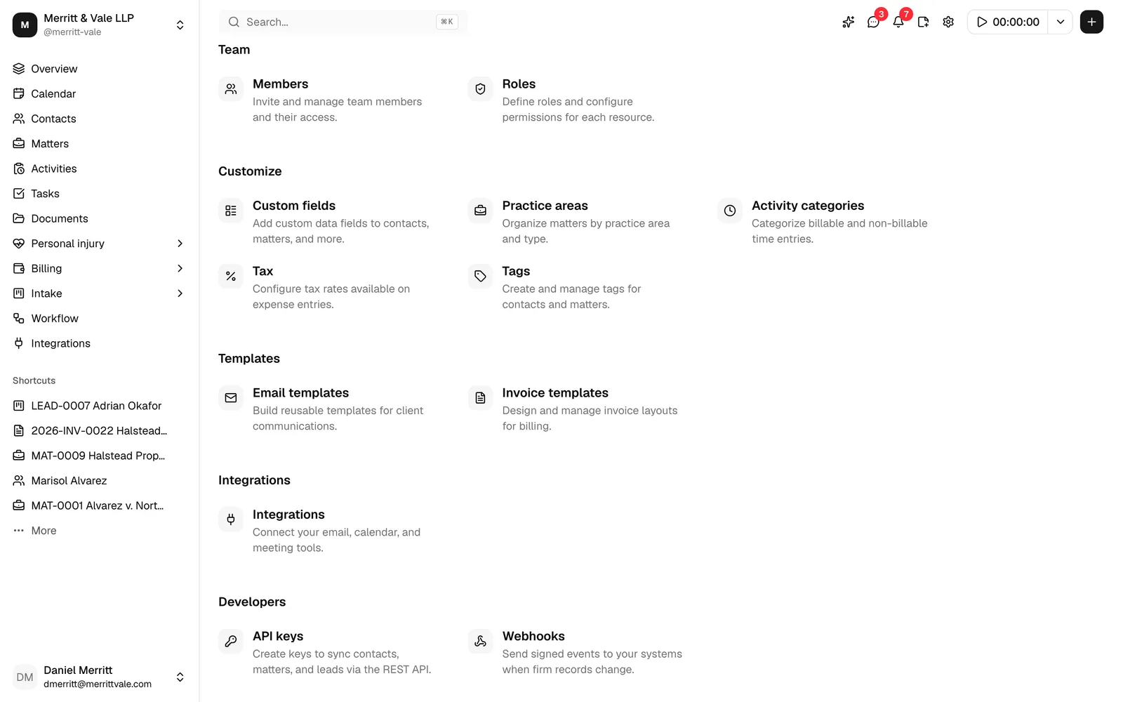 The Settings hub scrolled to its last groups: Integrations, then Developers with the API keys card, described as "Create keys to sync contacts, matters, and leads via the REST API.", and the Webhooks card.