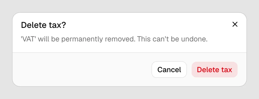 The Delete tax? confirmation dialog with its warning text and the Delete tax button.